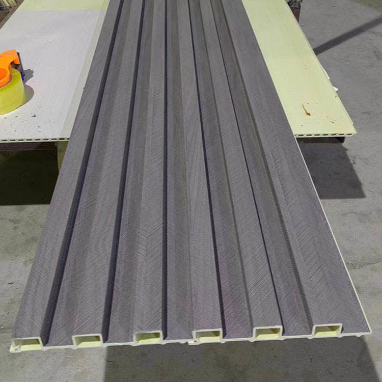 El panel de pared interior de la decoración los 2.5cm casera moderna WPC de 9m m para el fondo de la TV