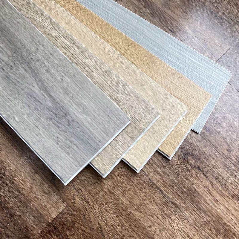 Material ecológico azulejos de madera resistentes al fuego piso clic PVC piso de vinilo piso de PVC para interiores