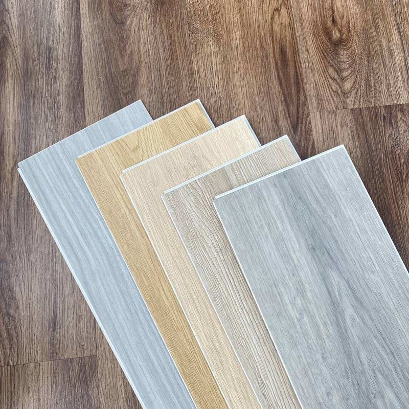 Material ecológico azulejos de madera resistentes al fuego piso clic PVC piso de vinilo piso de PVC para interiores