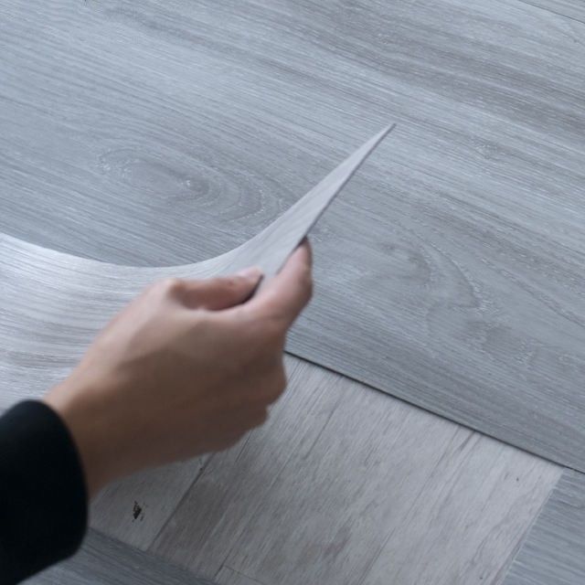 Tejas de vinilo textura de madera LVT suelo autoadhesivo pvc piso de vinilo impermeable tabla de vinilo
