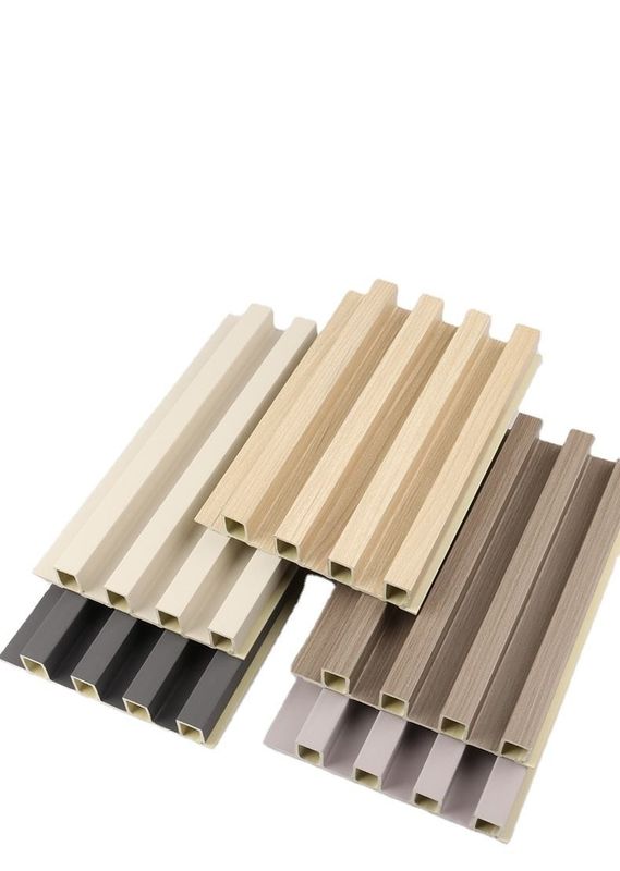 Precio barato Materiales de construcción de casas decorativas Económicas Granos de madera Pvc Wpc paneles de pared