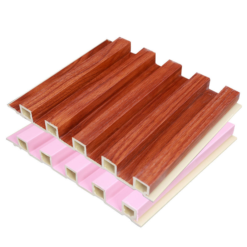 Fabrica de decoración de interiores de madera plástico compuesto Pvc revestimiento revestimiento de pared de tablero de fluido Wpc panel de pared interior