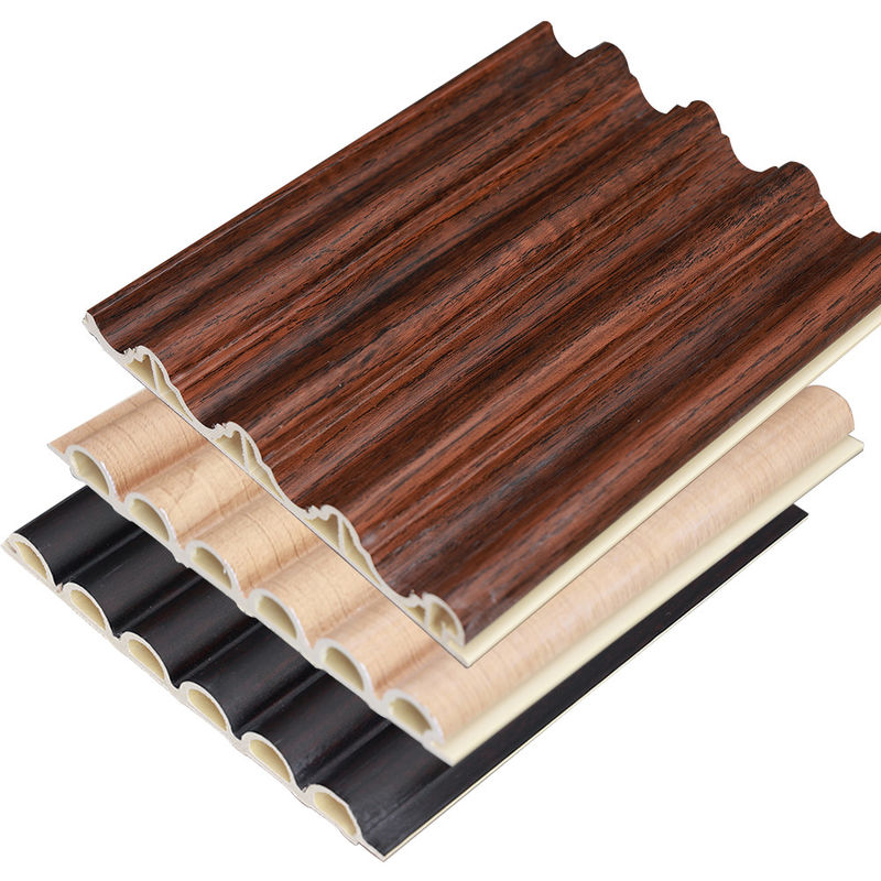 Fabrica de decoración de interiores de madera plástico compuesto Pvc revestimiento revestimiento de pared de tablero de fluido Wpc panel de pared interior