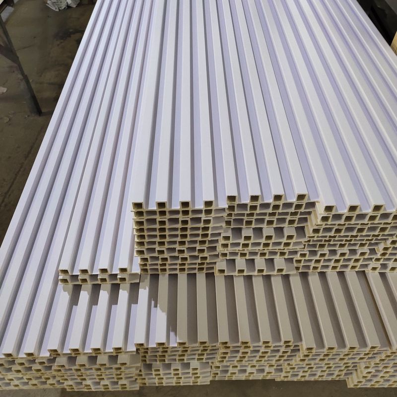 Panel de pared interior impermeable con diseño moderno de PVC para decoración del hogar