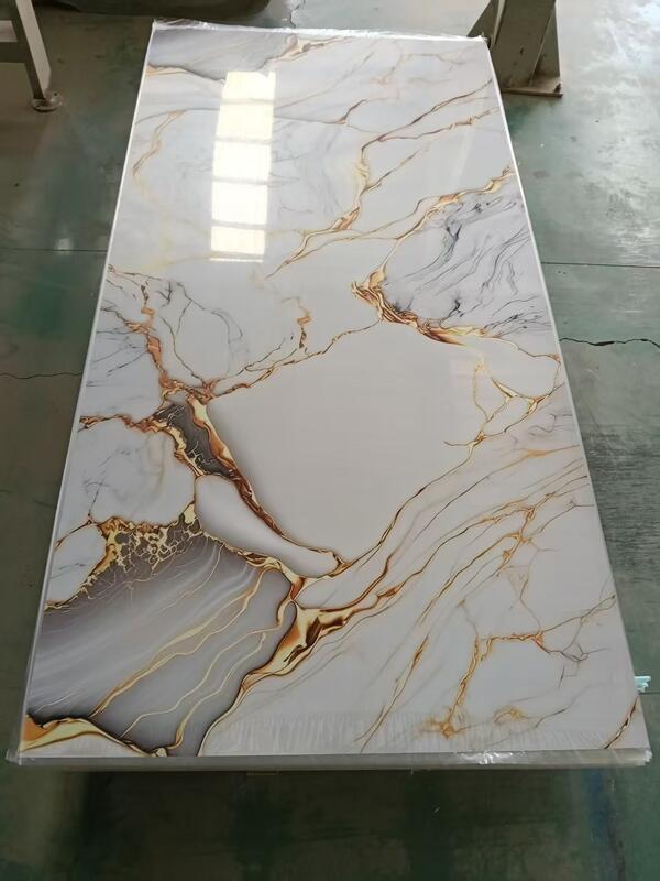 Fábrica de suministro directo de color oro de venta al por mayor de la placa de revestimiento UV de PVC flexible de la hoja de mármol de la pared panel decorativo